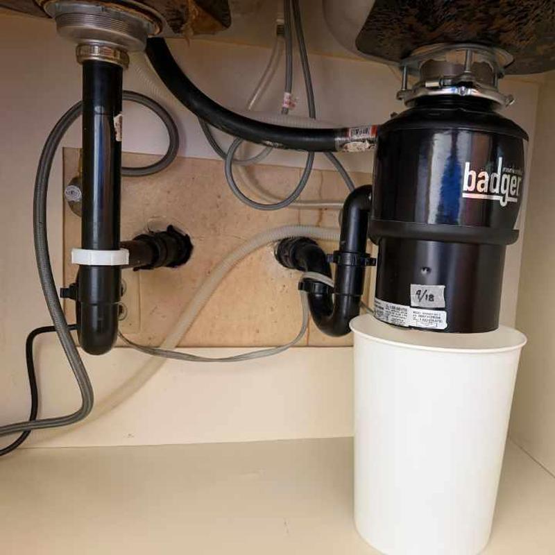 Badger garbage disposal installed under kitchen sink