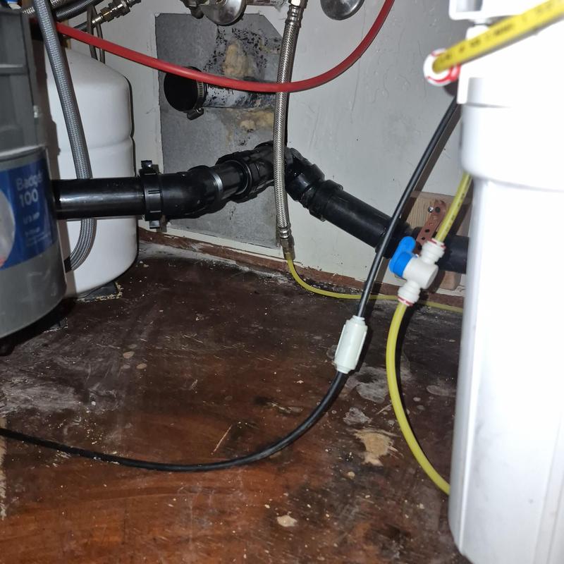 Kitchen sink drain tee and water lines under drywall