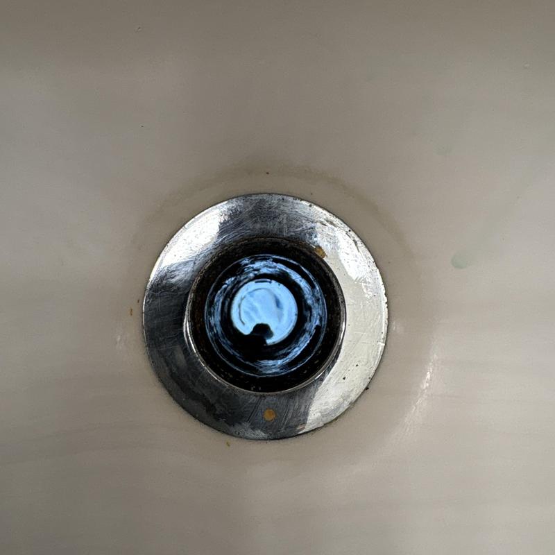 P-trap drain assembly clean in sink drain pipe