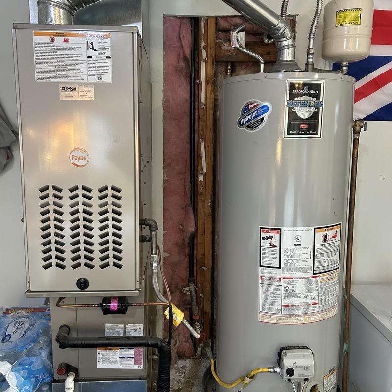 Water heater leak repair with exposed wall insulation Water heater leak repair with exposed wall insulation