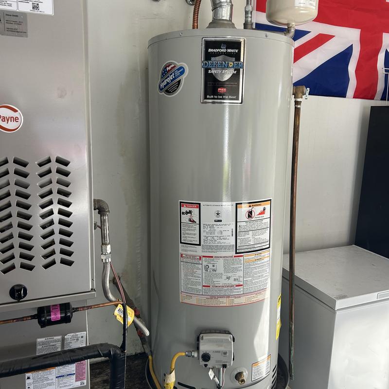 Water heater with repaired leak behind wall Water heater with repaired leak behind wall