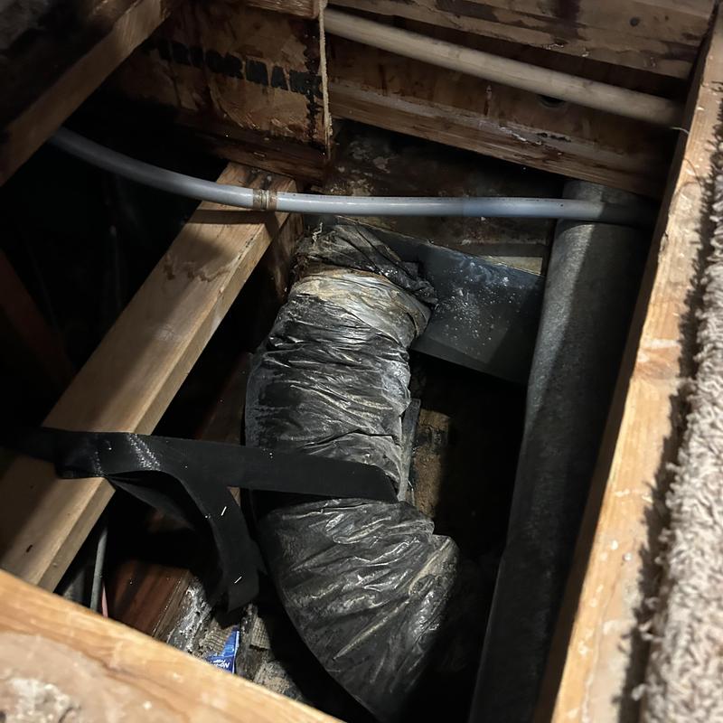 Water heater drain line with leak damage behind wall Water heater drain line with leak damage behind wall