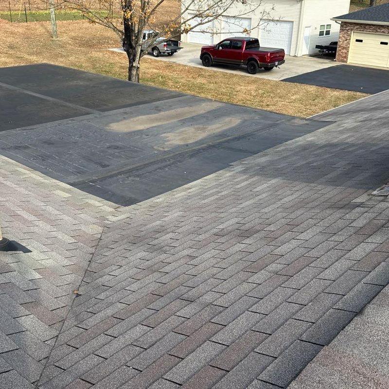 Asphalt shingles roof with hail damage patches