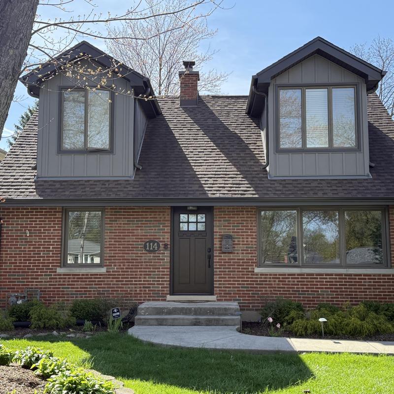 Composite siding and windows with gutters and fascia Composite siding and windows with gutters and fascia