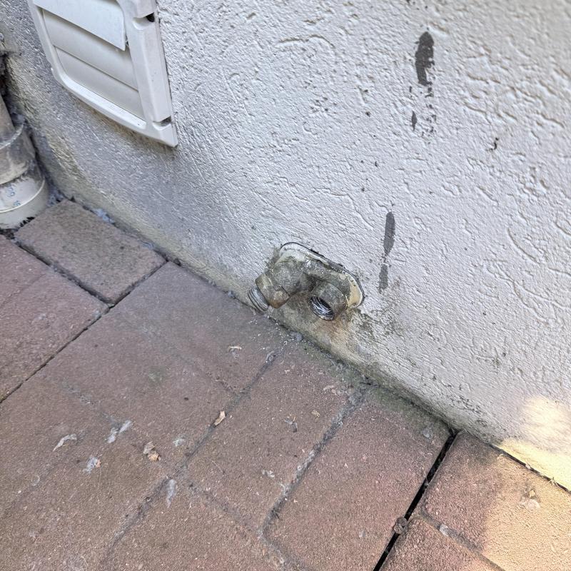 Silcock wall connection with vacuum breaker location