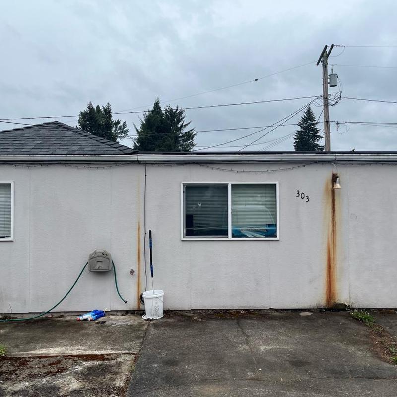 Gutter system on flat roof with rust stains Gutter system on flat roof with rust stains