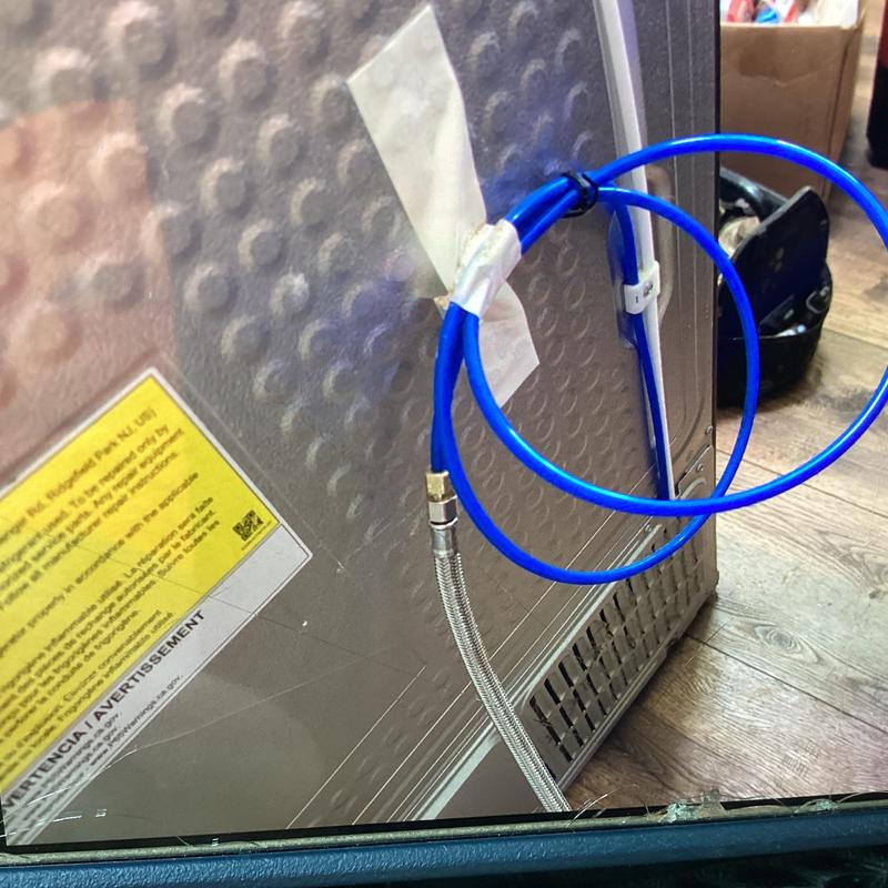 Ice maker water supply line installation with braided hose
