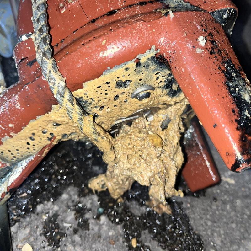 Sewage ejector pump with debris and new retrieval chain Sewage ejector pump with debris and new retrieval chain