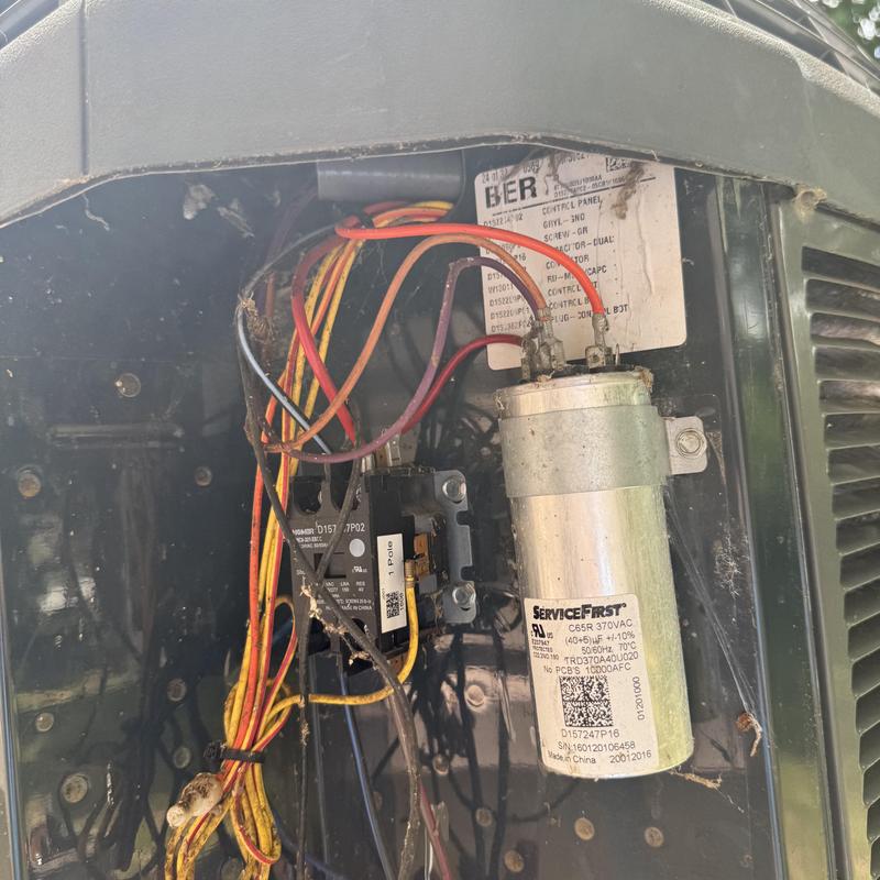 HVAC capacitor and wiring inside outdoor unit panel HVAC capacitor and wiring inside outdoor unit panel