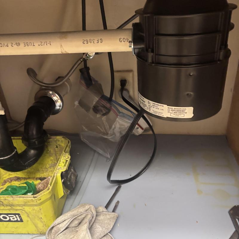 12 hp garbage disposal and drain line cleaning under sink