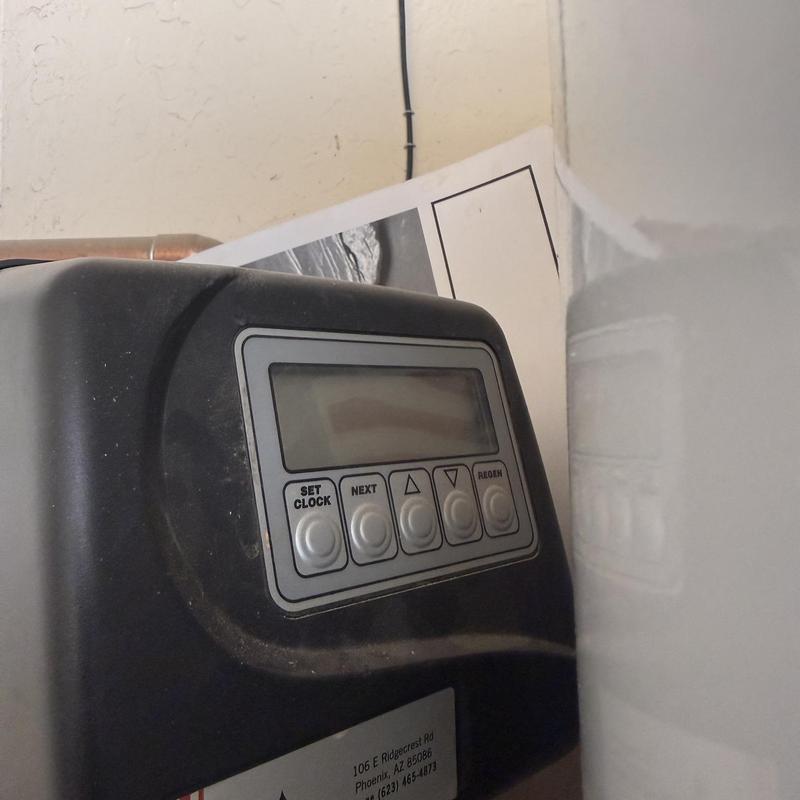 Water softener control panel with setting buttons