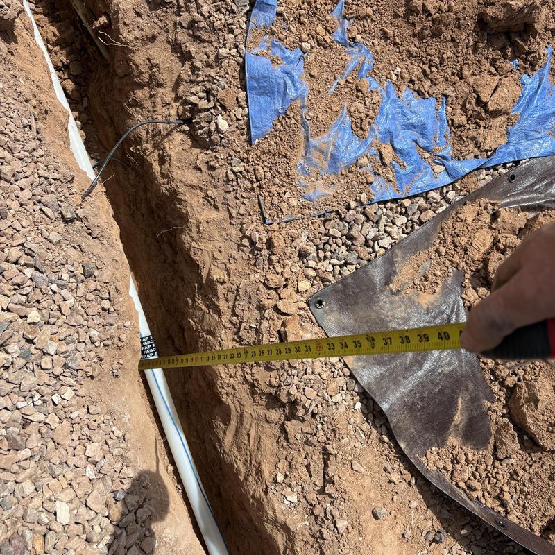 Main water service line depth measurement in trench