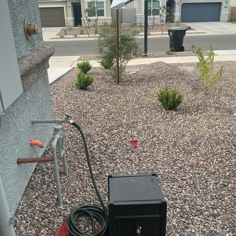 Main water service line with pressure test box outdoors