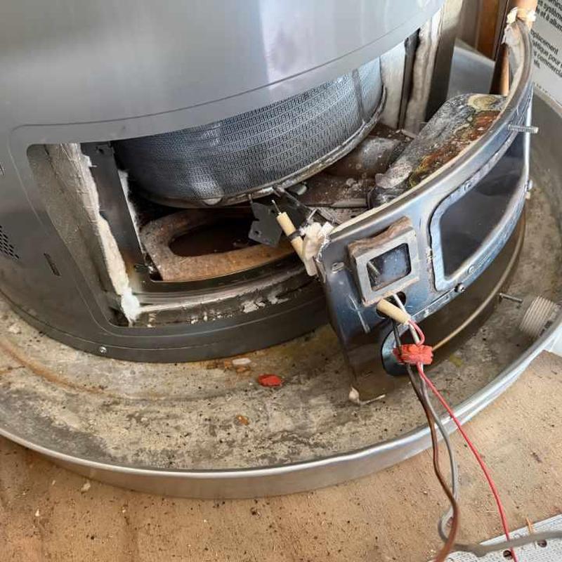 Water heater pilot assembly with wiring exposed