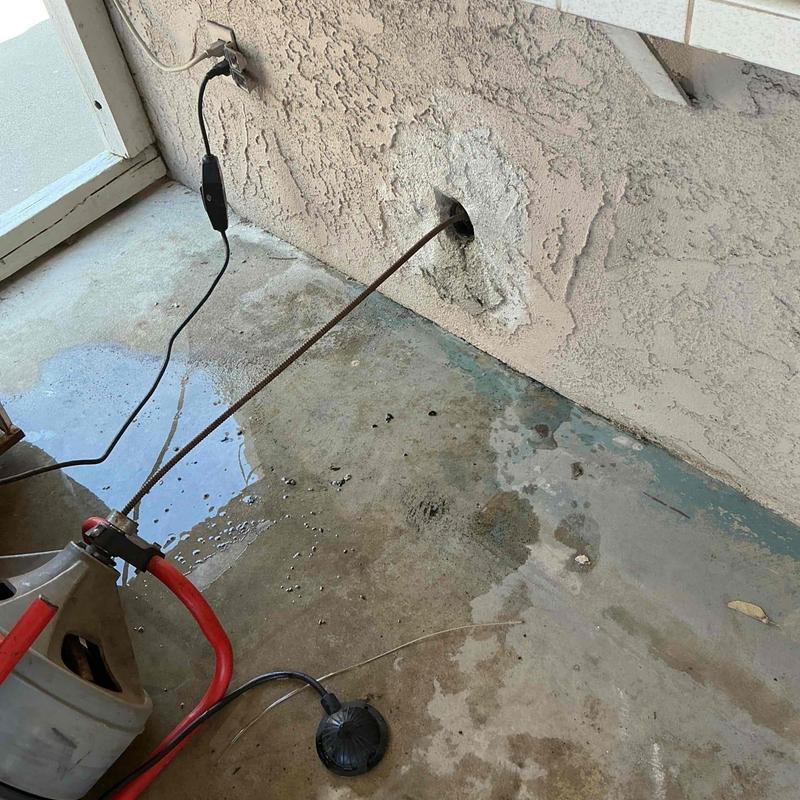 Kitchen drain line snaking from wall cleanout clog