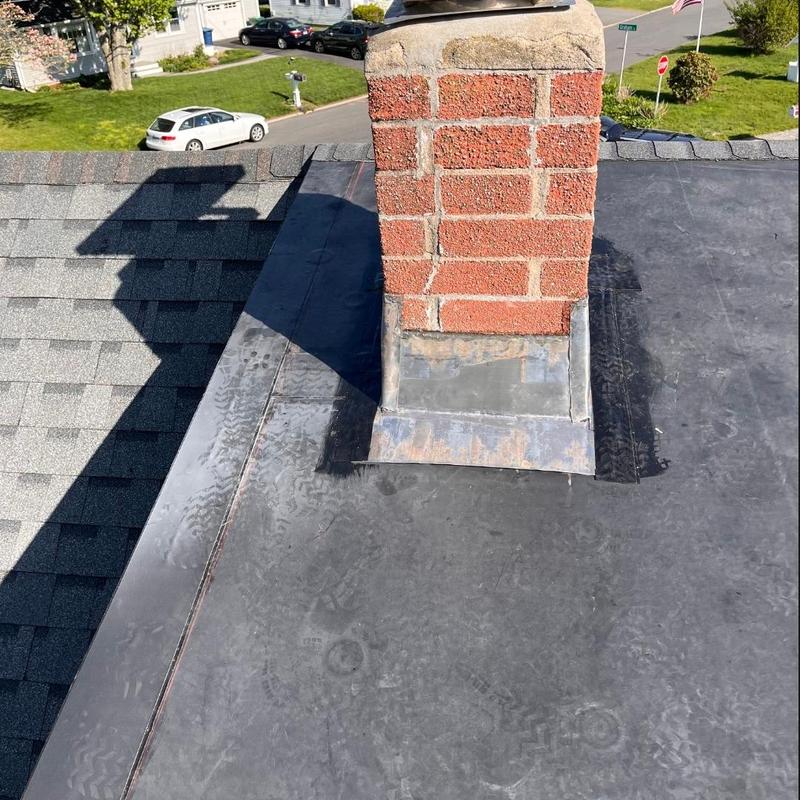 Chimney flashing on flat roof in Waterford CT Chimney flashing on flat roof in Waterford CT