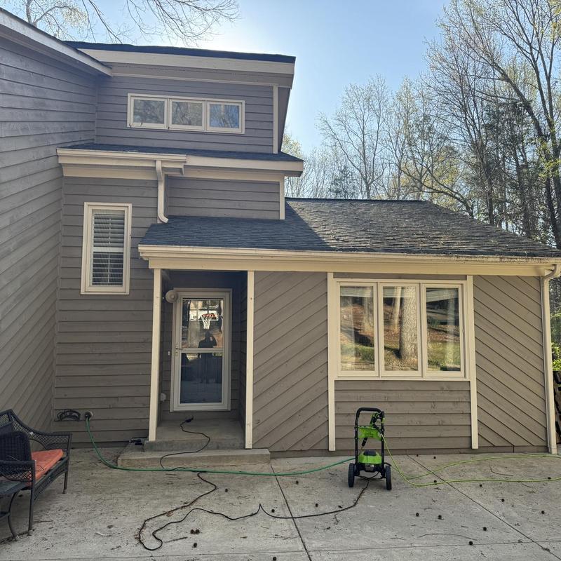 White gutter replacement on house exterior White gutter replacement on house exterior