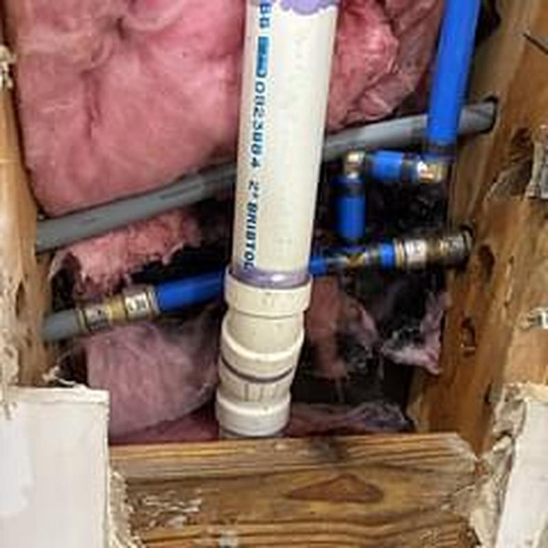 Water line piping behind drywall with insulation removed