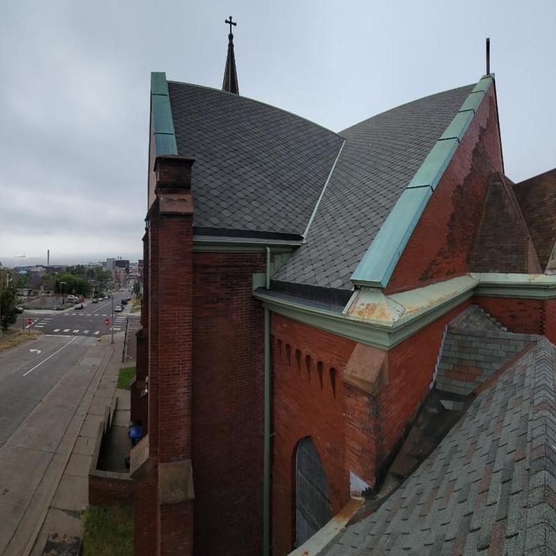 Slate roof and copper flashing inspection on church building Slate roof and copper flashing inspection on church building