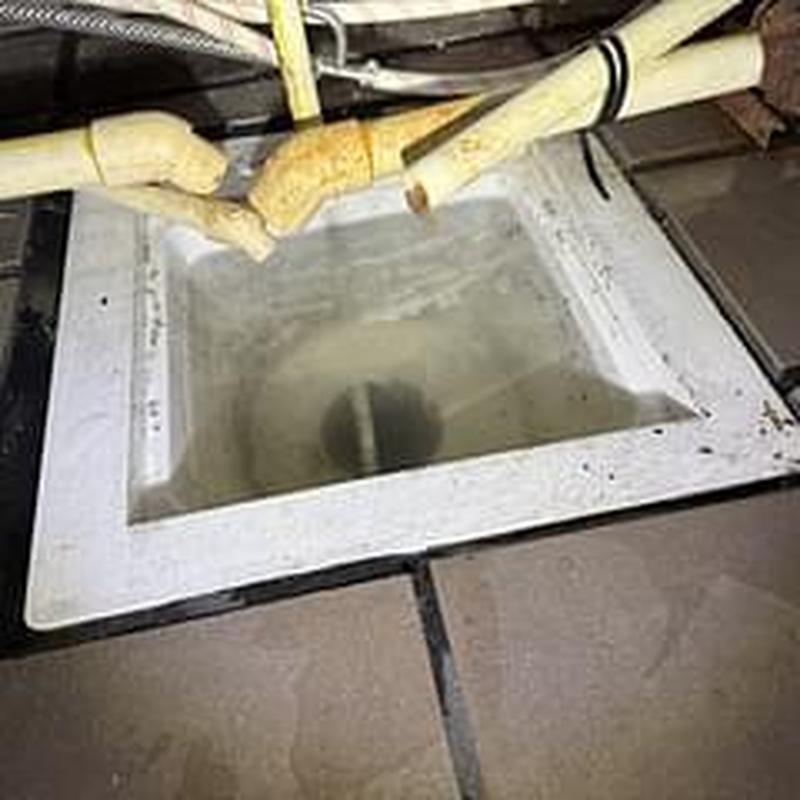 PVC pipes above ice bin with repaired joints