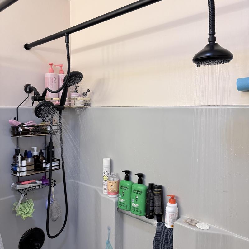 Shower head and arm installation with water flow running