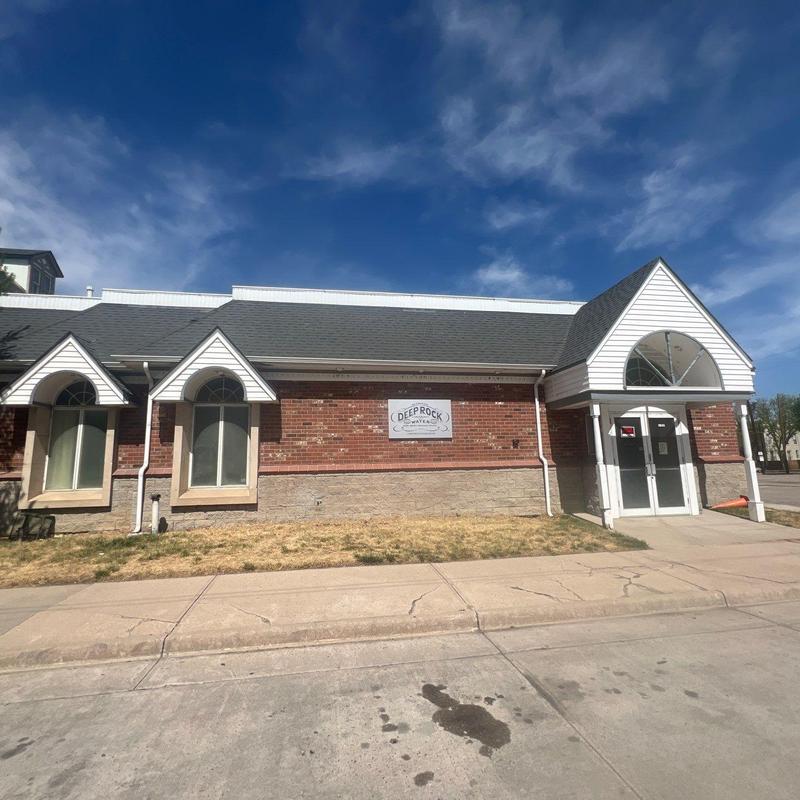 Modified bitumen roof on commercial brick building