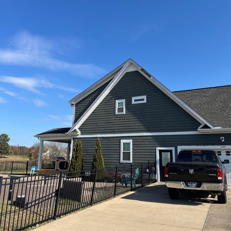 Asphalt shingle roof with hail damage inspection