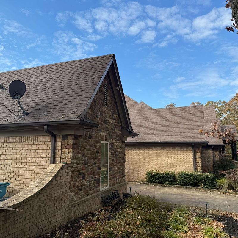 Asphalt shingle roof with hail damage inspection