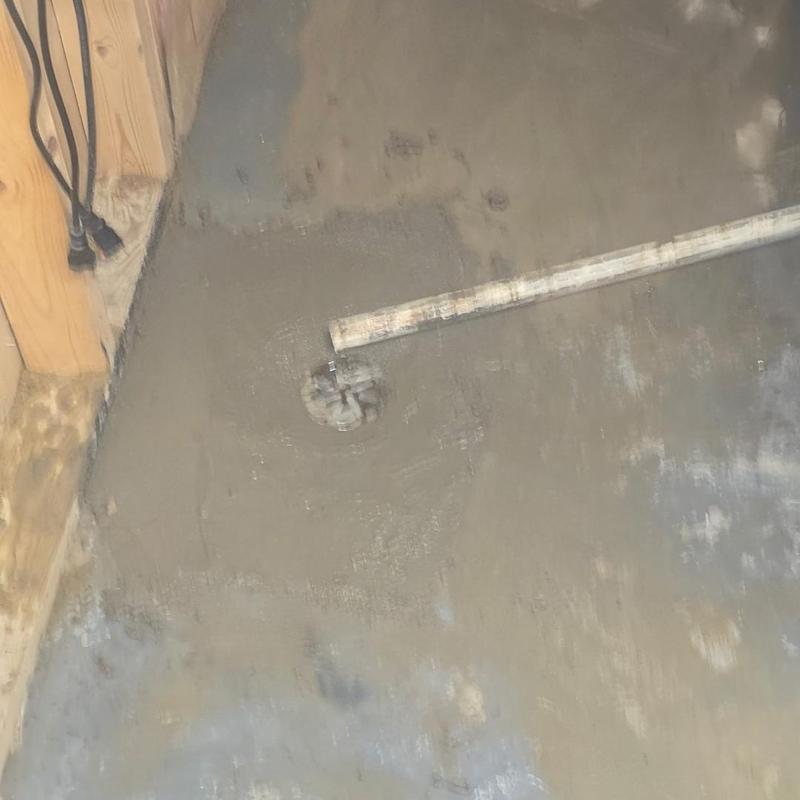 Cast iron floor drain with self-leveling cement patch
