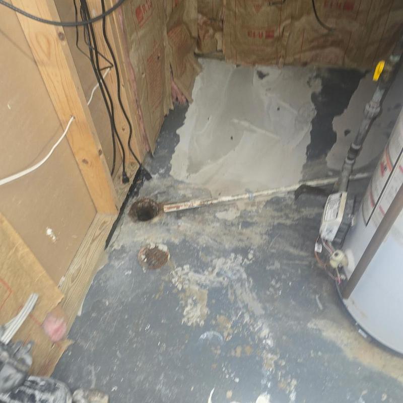 Cast iron floor drains with couplings in mechanical room