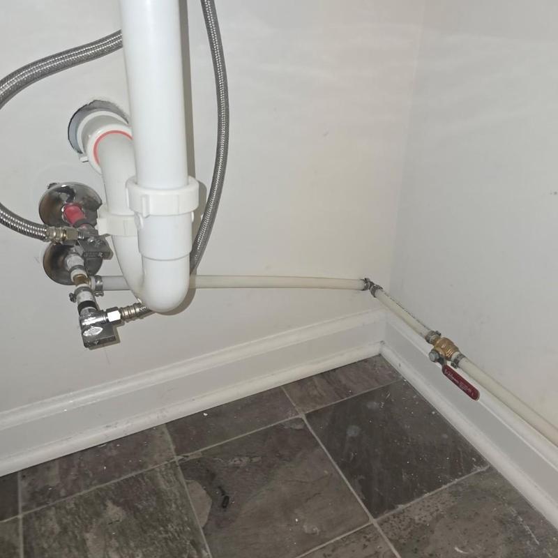 PVC drain pipe and water shutoff valve installation