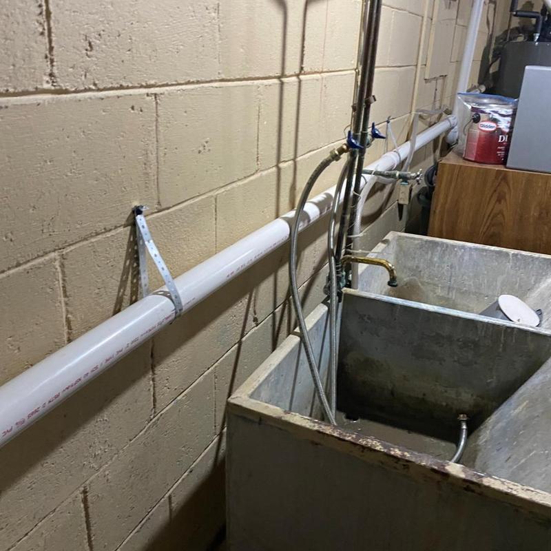 Laundry sink plumbing and PVC drain pipe installation