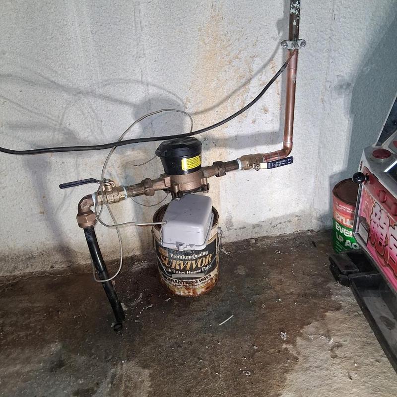 Water meter with replaced valves and removed bypass