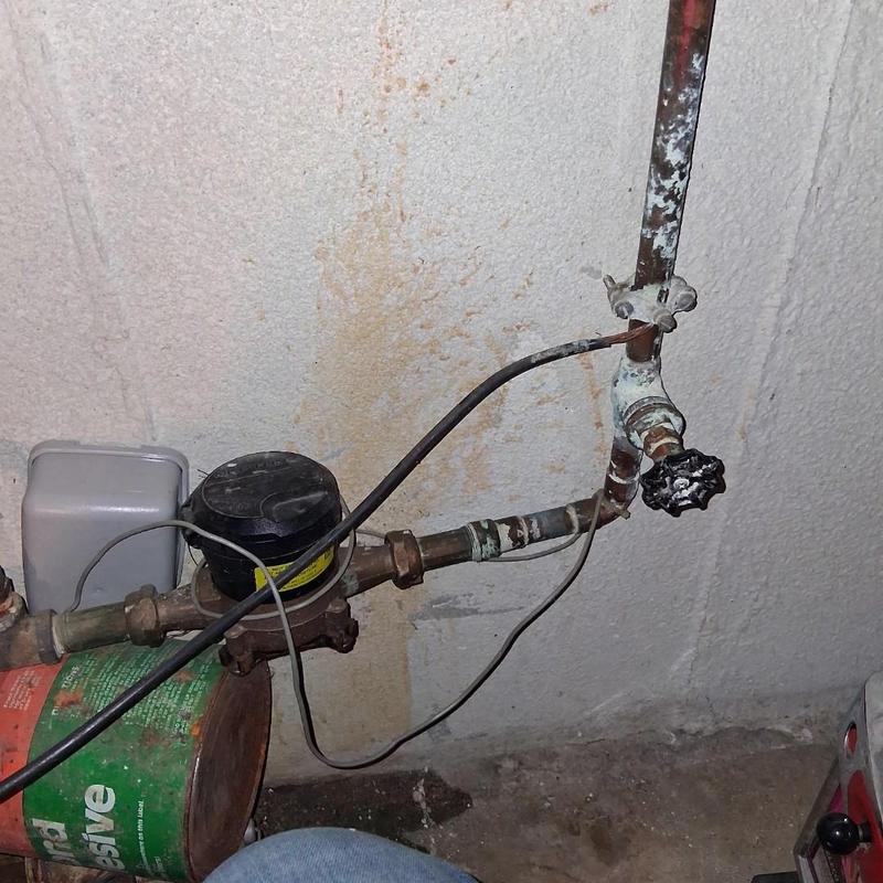 Water meter valves and pipe bypass removal in basement