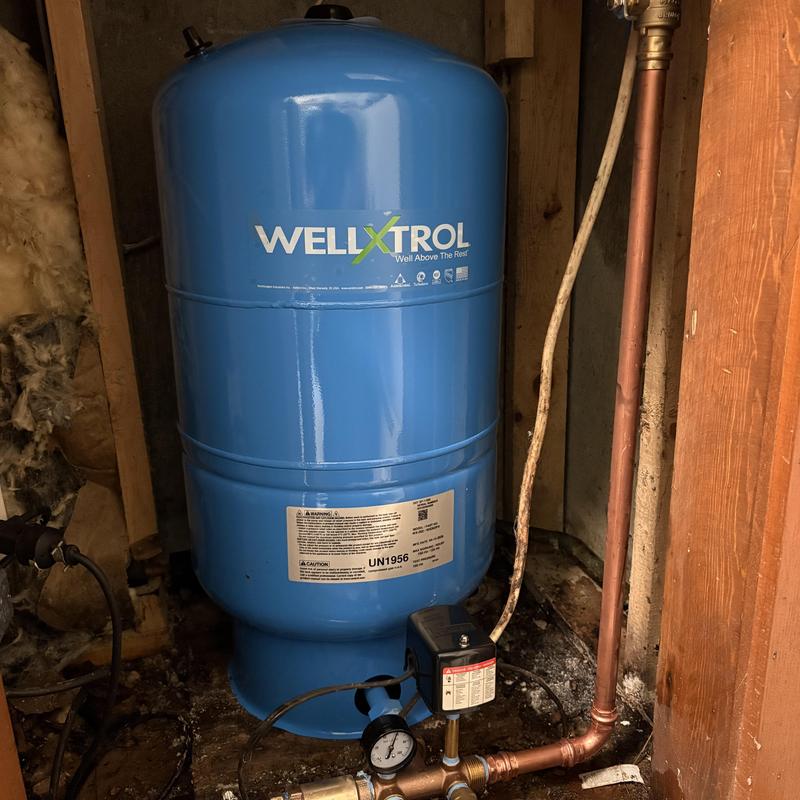 Wellxtrol pressure tank installed in basement plumbing system