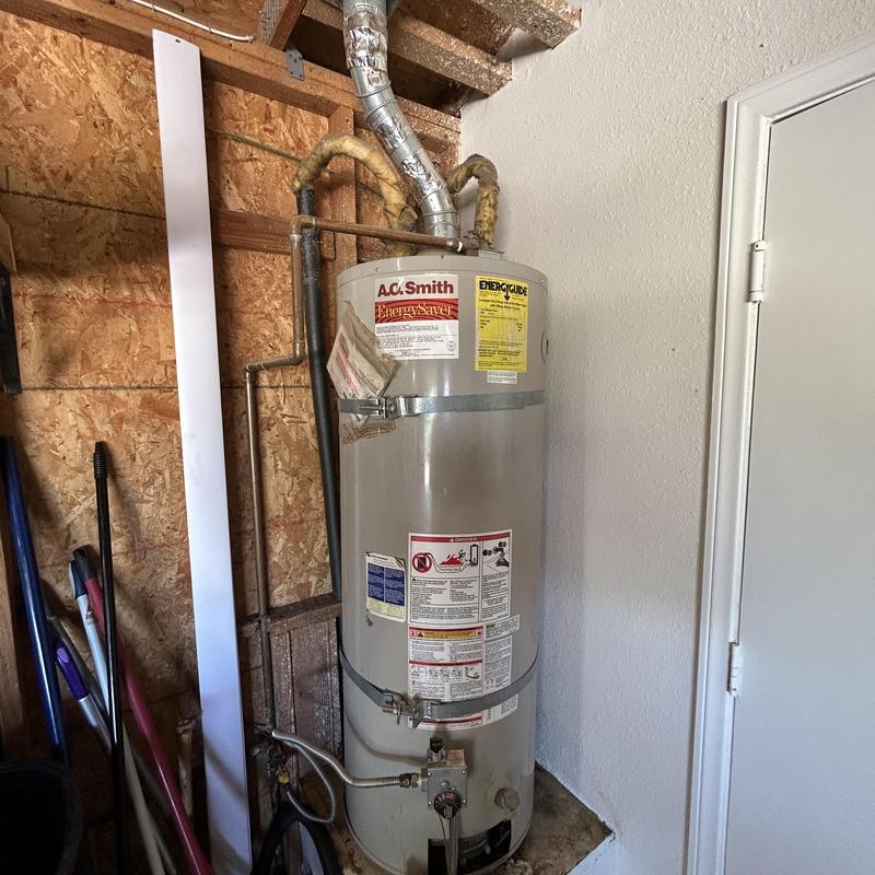 Water heater installation with new gas and water lines