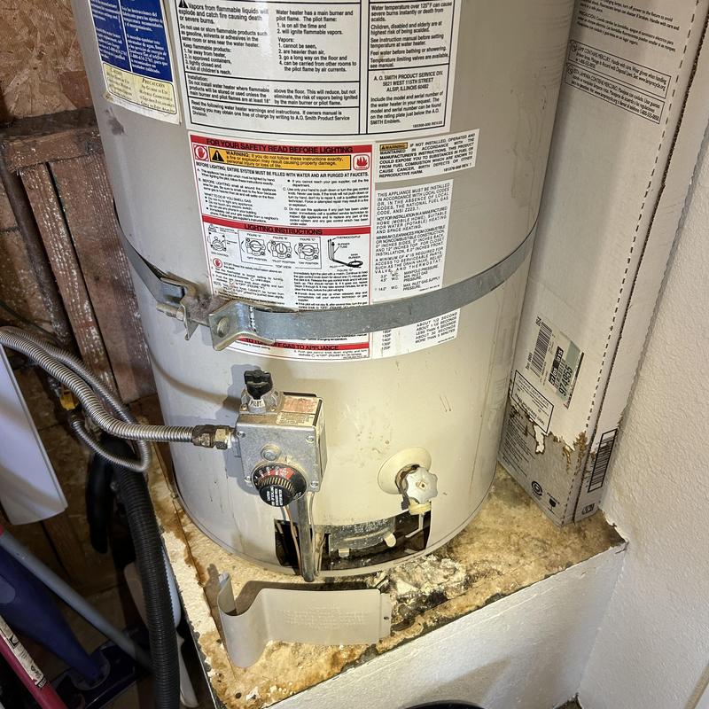 Water heater with gas control and supply line