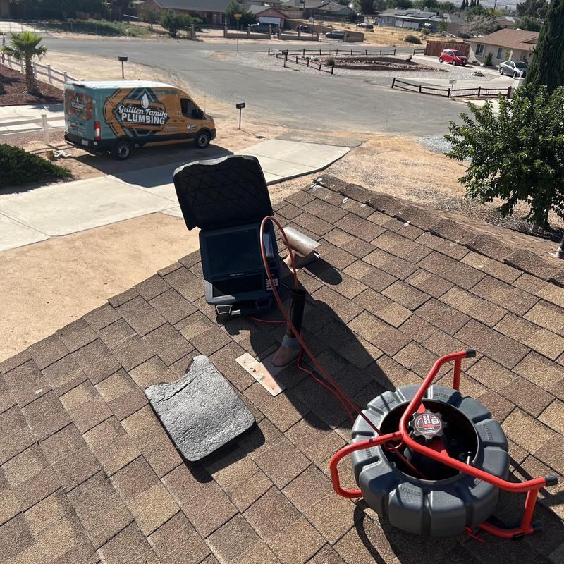 Sewer drain line inspection and hydro jetting equipment on roof