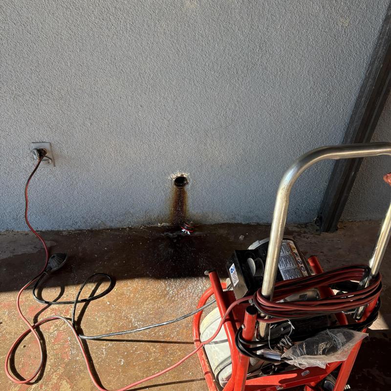 Kitchen drain cleanout with sewer machine cable and grease removal