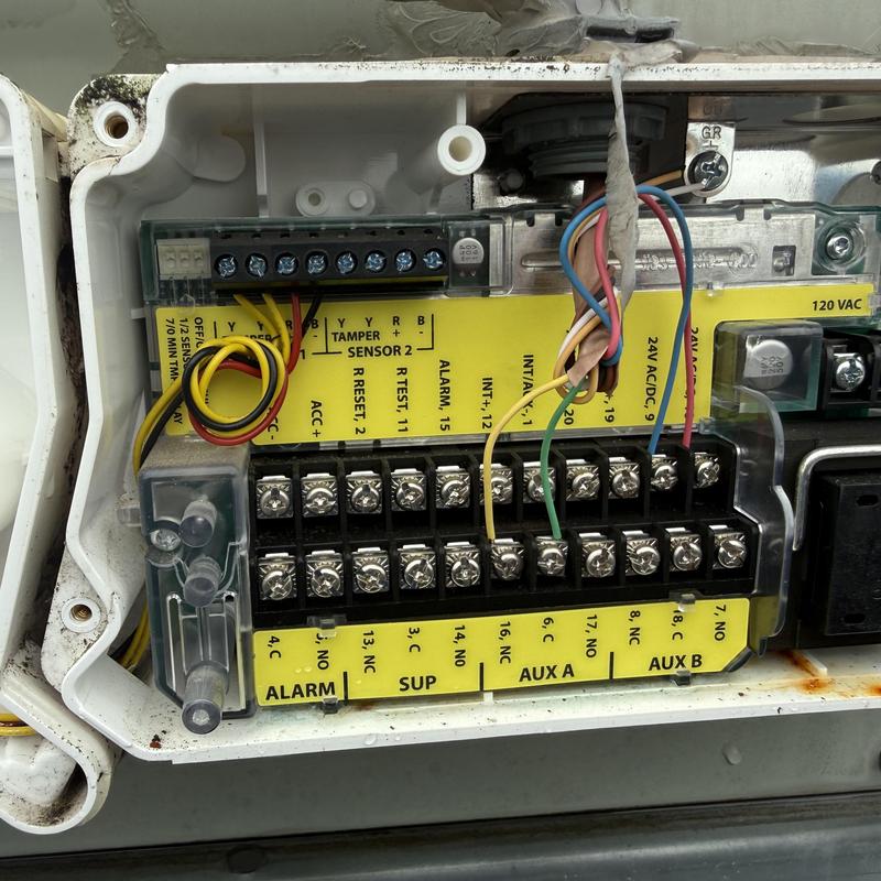 Smoke alarm control panel wiring connections close-up Smoke alarm control panel wiring connections close-up