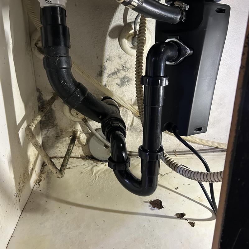 Kitchen sink drain pipes and new garbage disposal installation