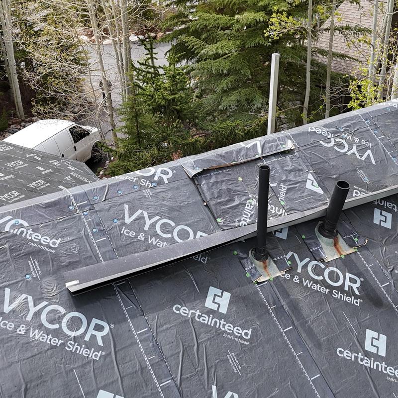 Ice and water shield underlayment on roof with vents