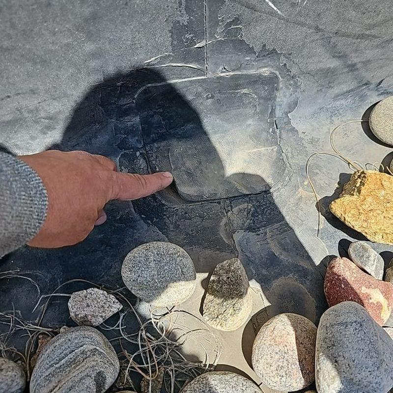 Ballast system membrane damage with rocks and debris