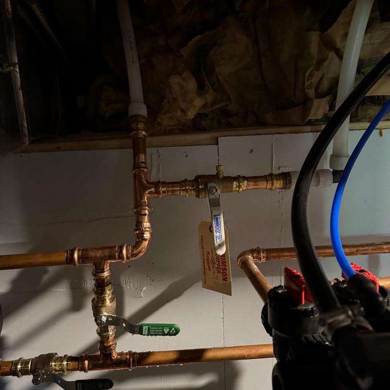 Copper water line with shutoff valves and fittings