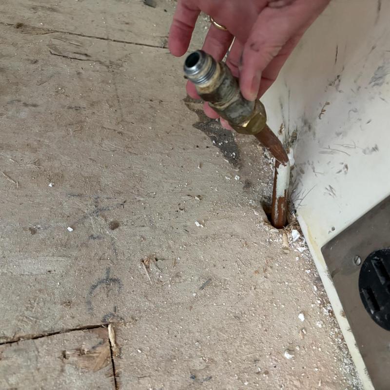 Gas line pinched tubing with brass fitting repair