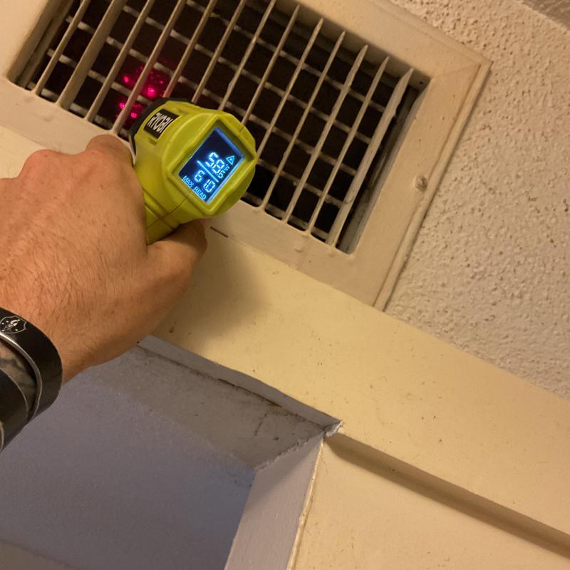 HVAC air vent temperature check with infrared gun HVAC air vent temperature check with infrared gun