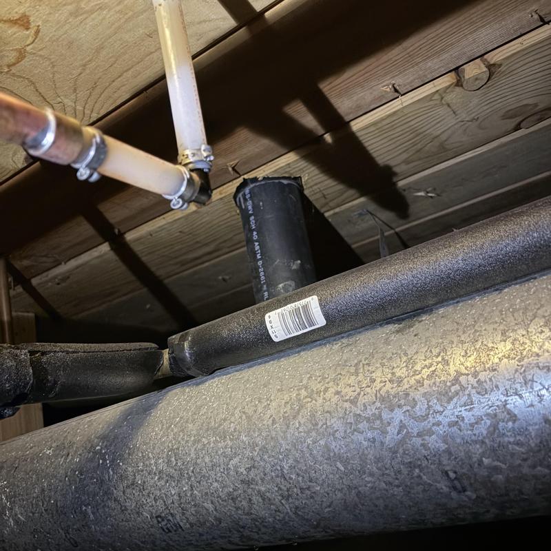 Copper water pipes with new PEX replacement in crawlspace