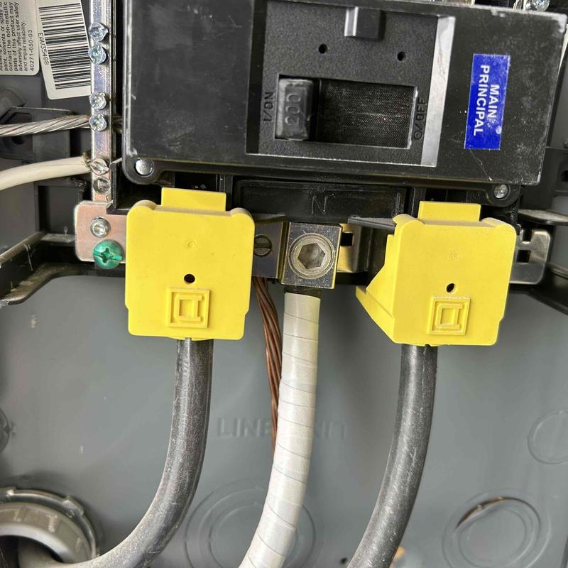 Circuit breaker with main disconnect and yellow safety covers Circuit breaker with main disconnect and yellow safety covers