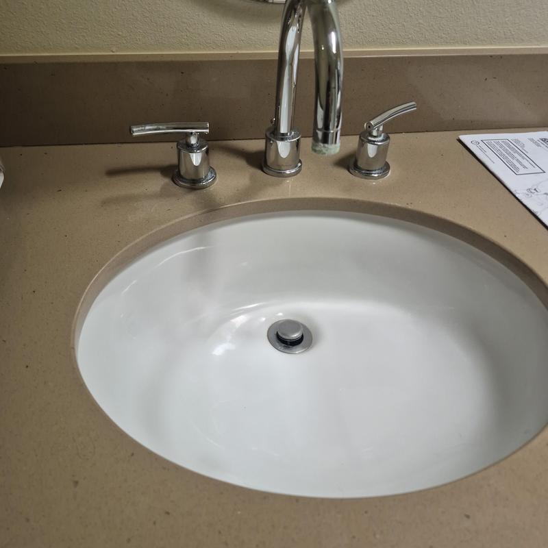 Widespread lavatory faucet with lever handles