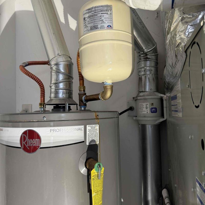 Gas water heater with thermal expansion tank and piping Gas water heater with thermal expansion tank and piping